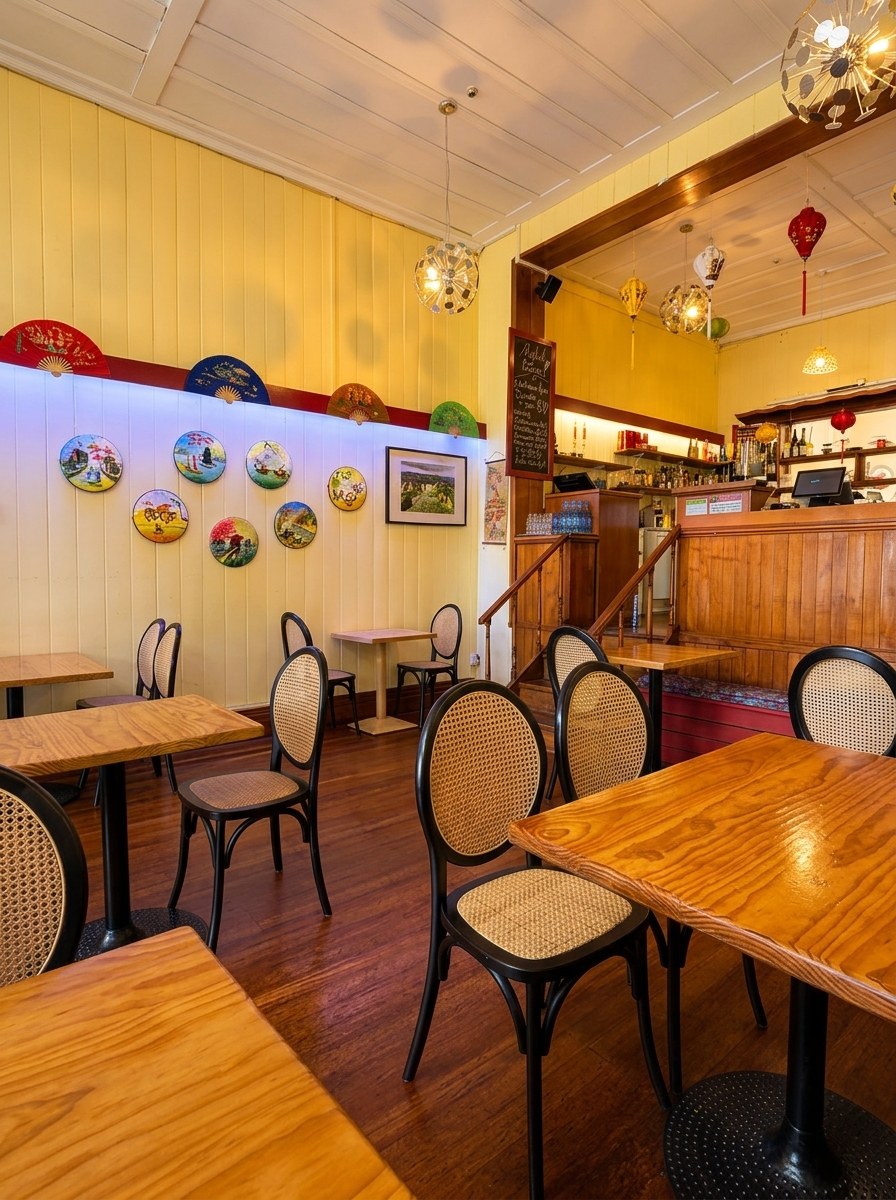 An An Vietnamese Restaurant cozy dining room with decorative wall fans